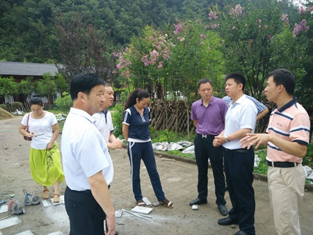 纪道清调研野人谷生态科技发展有限公司产业项目