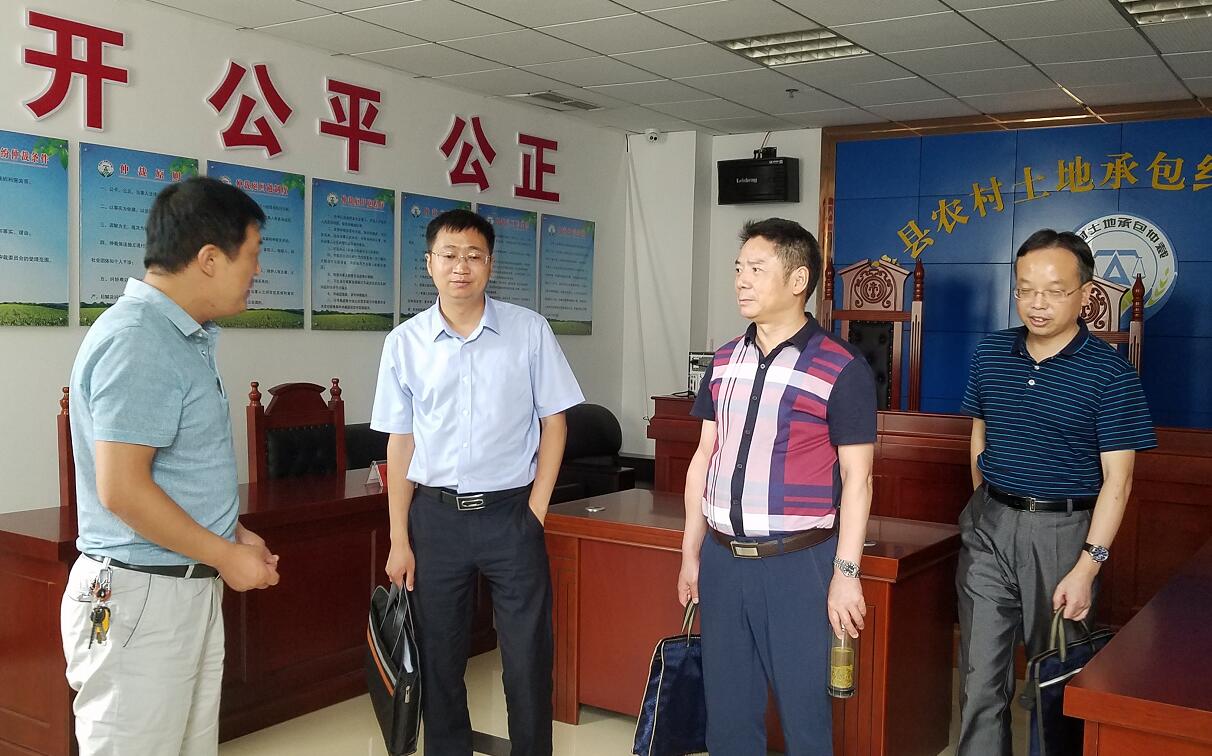 市经管局局长罗会权一行来房调研农经工作